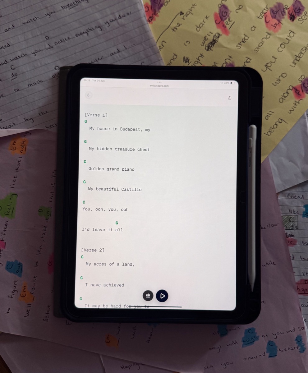 SetBase Pro running on a tablet surrounded by sheet music
